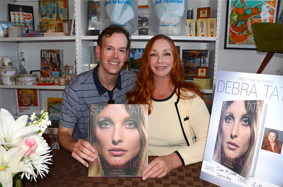 Book designer Stephen Schmidt (left) with author Debra Tate